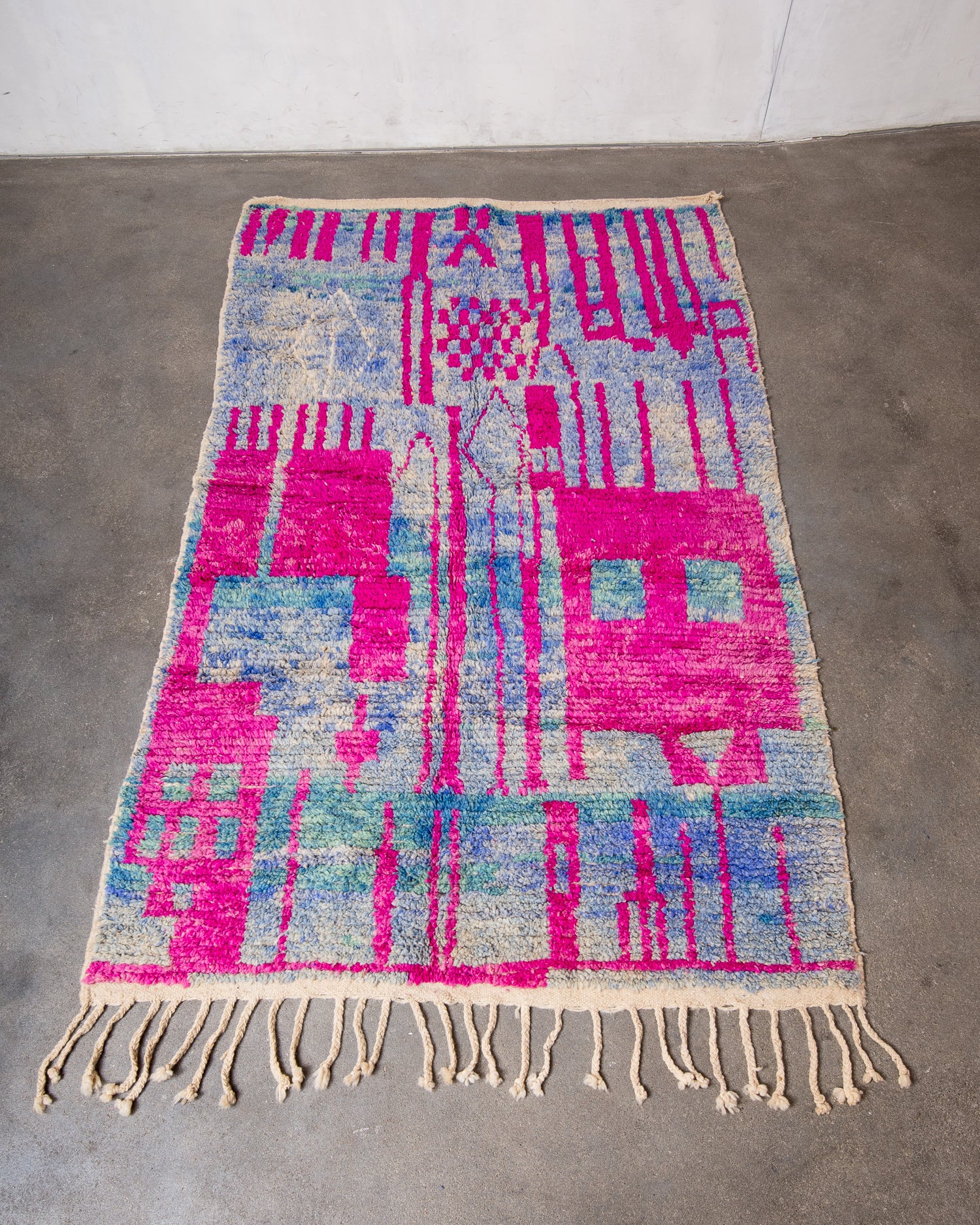 Modern, designer, handcrafted Berber rug from Morocco. Vintage carpet with beautiful colours and patterns and fluffy texture.